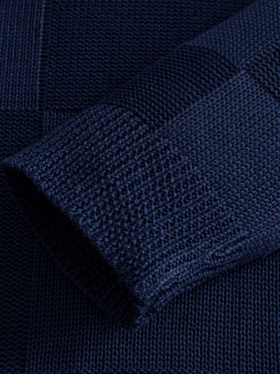 OROMEN Geometric Block Textured Sweater sleeve cuff detail showing structured ribbed knit finish