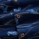 OROMEN Hokusai Kairin shirt branded coconut button close-up, Ukiyo-e wave print on deep navy