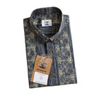 OROMEN Indigo Batik shirt folded with branded tag and coconut buttons detail