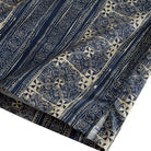 OROMEN Indigo Batik shirt side vent and hem detail, navy Batik stripe with double needle stitching