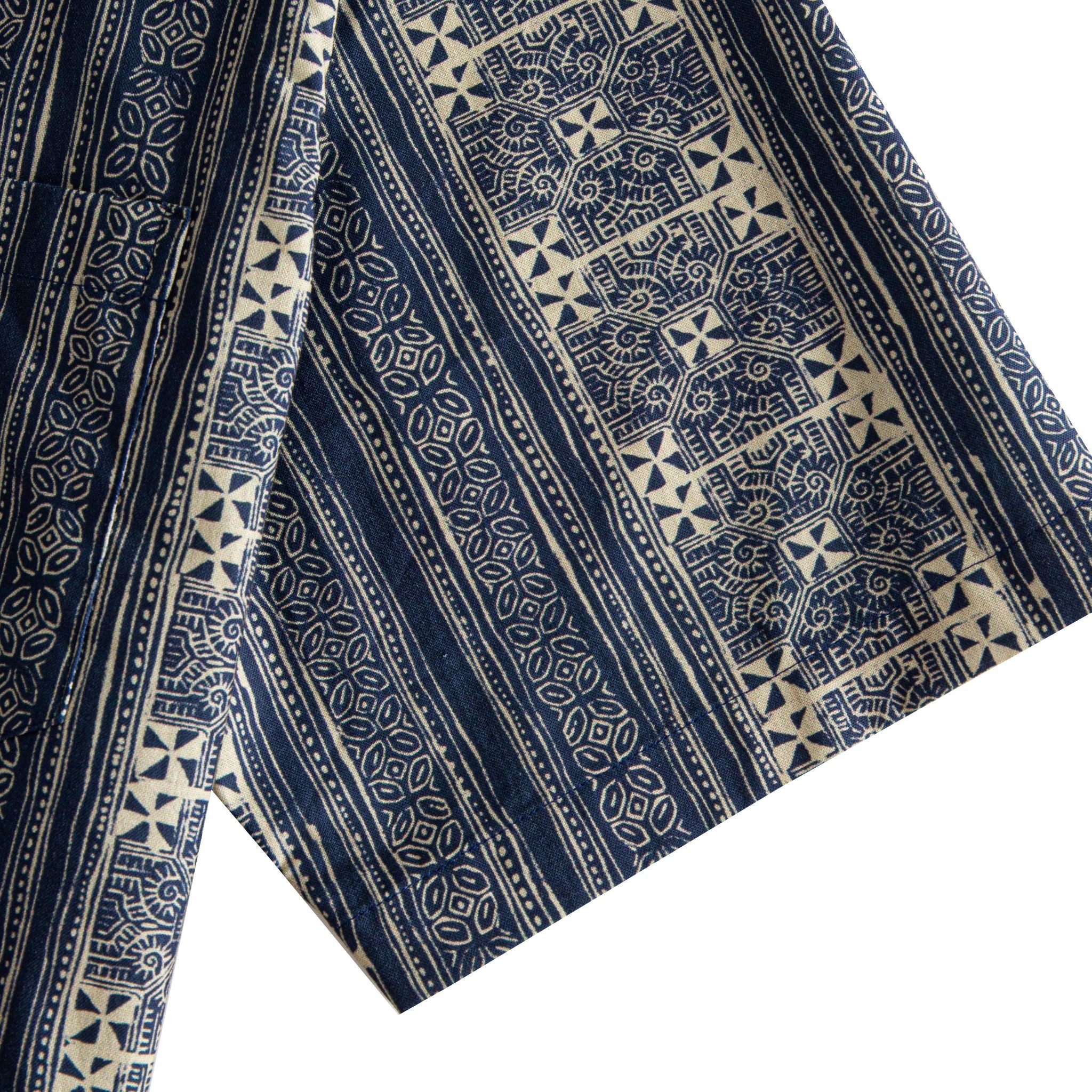 OROMEN Indigo Batik shirt sleeve detail, geometric Batik stripe in navy and off-white cotton