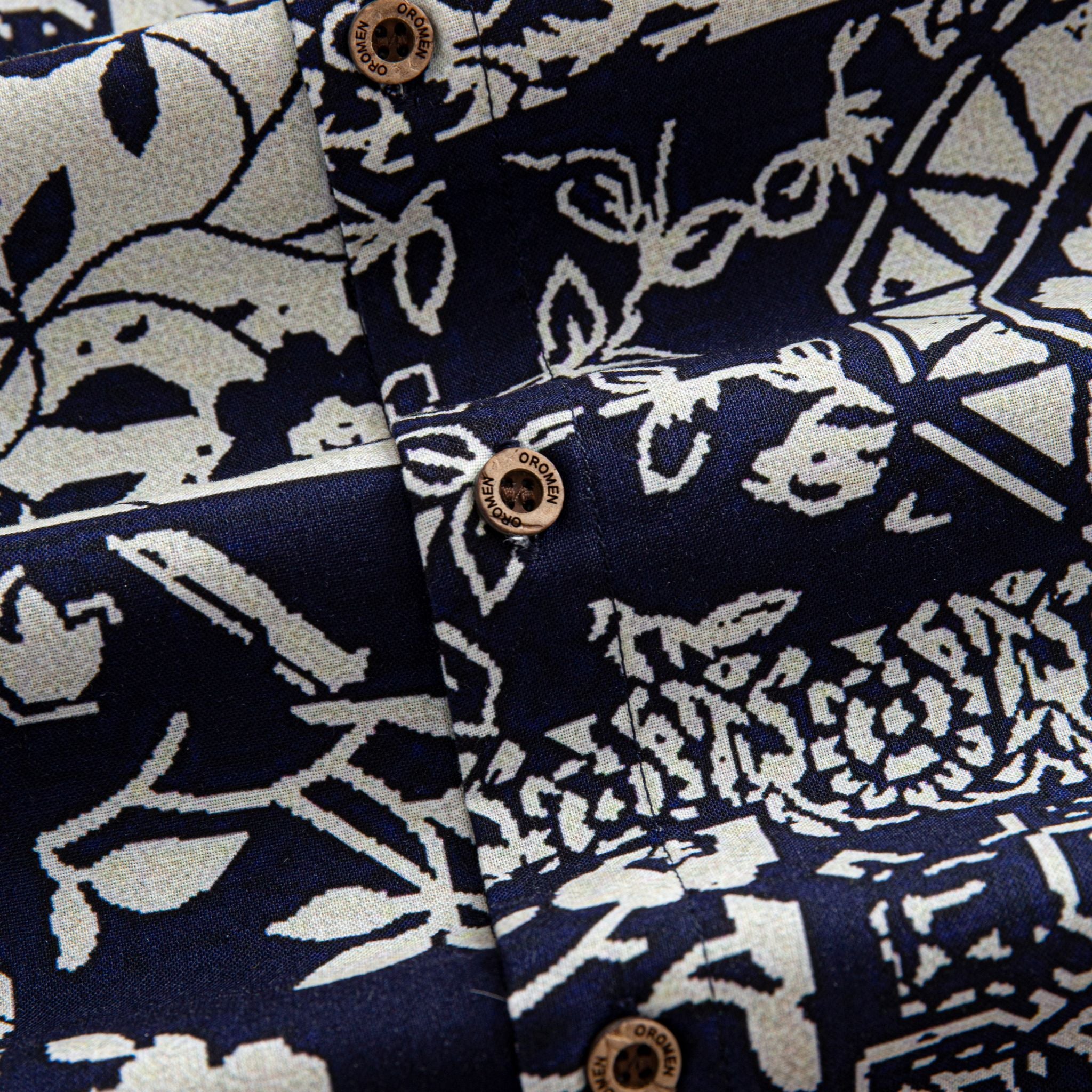 OROMEN Indigo Katazome shirt branded coconut button close-up