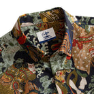 OROMEN Kabuki Warriors shirt button-down collar detail showing OROMEN branded label and Japanese Ukiyo-e warrior print on dark navy ground