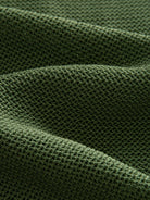 OROMEN Marcel Striped Knit Polo fabric detail highlighting breathable cool-touch vertical stripe knit