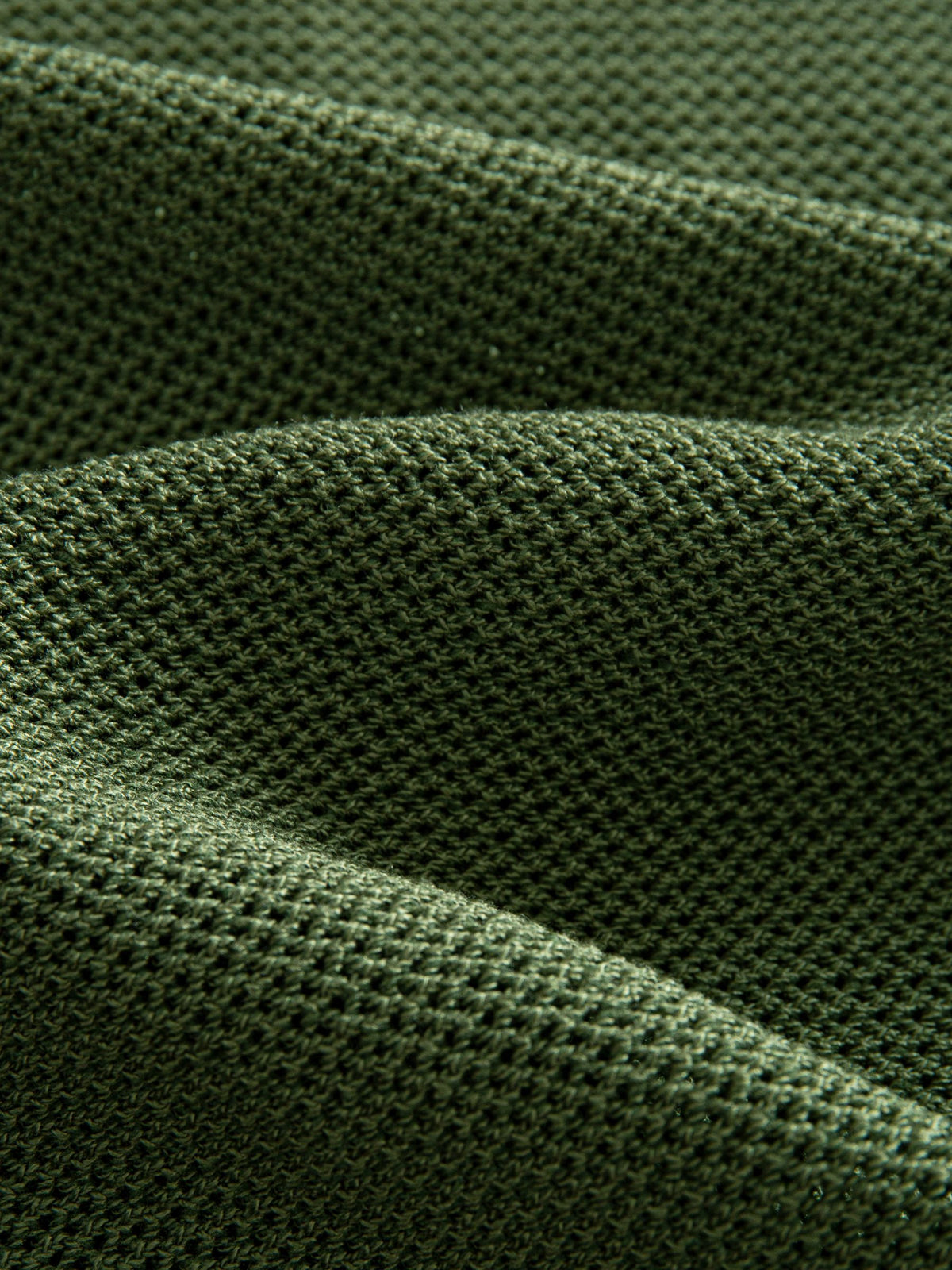 OROMEN Marcel Striped Knit Polo fabric detail highlighting breathable cool-touch vertical stripe knit