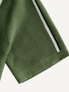 OROMEN Marcel Striped Knit Polo short sleeve cuff detail showing clean ribbed knit finish