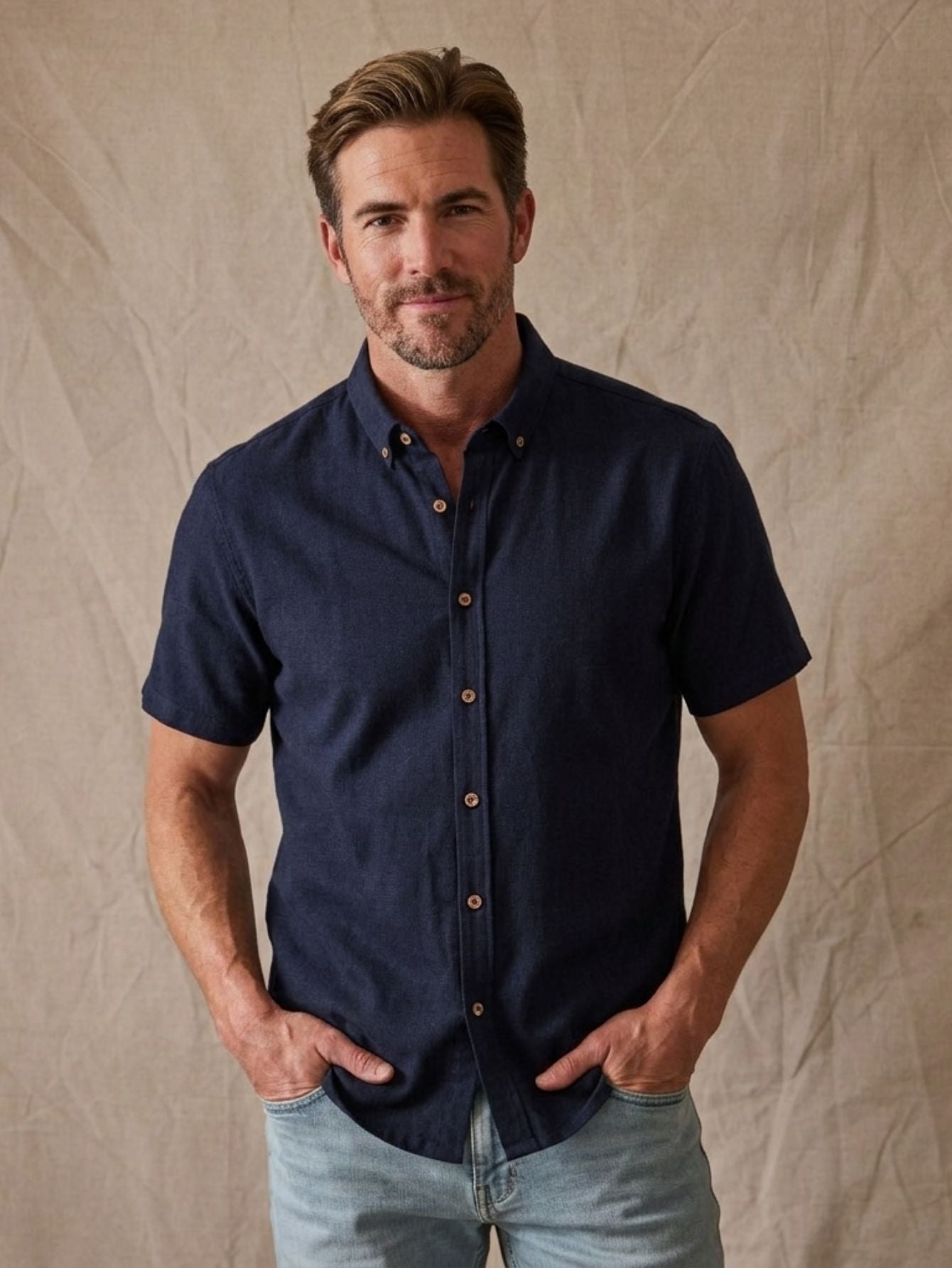OROMEN Navy Blue Freshwater Everyday Shirt — Classic short-sleeved button-down shirt with textured fabric and bronze buttons, denim style - Model Image