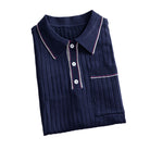 OROMEN Navy Ribbed Knit Polo Shirt — Folded Flat Lay Showing Spread Collar, White Button Placket and Red White Contrast Tipping Detail