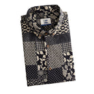 OROMEN Noir Patchwork shirt folded display showing OROMEN branded label, coconut buttons and allover monochrome patchwork print in black and off-white