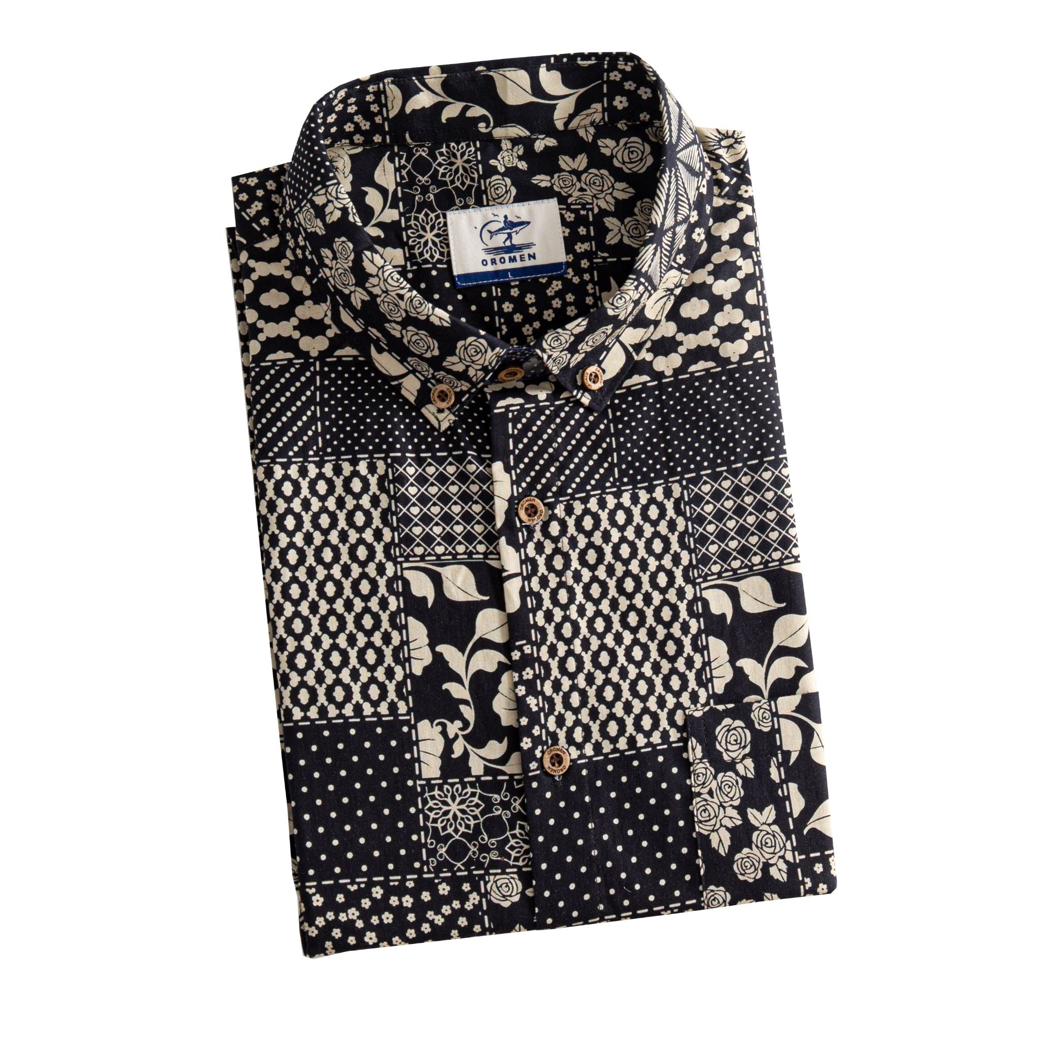 OROMEN Noir Patchwork shirt folded display showing OROMEN branded label, coconut buttons and allover monochrome patchwork print in black and off-white