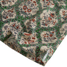 OROMEN Persian Garden shirt – hem and side slit detail hand-painted Persian botanical fabric texture