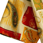 OROMEN Rajasthan Paisley shirt sleeve detail showing multi-color paisley patchwork motifs in crimson, amber and olive on cream 100% cotton