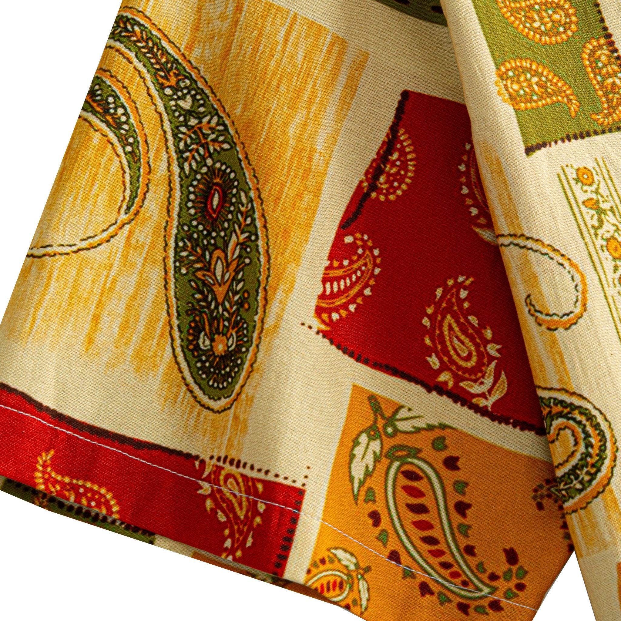 OROMEN Rajasthan Paisley shirt sleeve detail showing multi-color paisley patchwork motifs in crimson, amber and olive on cream 100% cotton