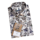OROMEN Reef Atlas Hawaiian shirt – folded front view showing hand-painted coral reef and tropical fish print on white 100% cotton