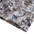 OROMEN Reef Atlas Hawaiian shirt – side vent and double needle stitching detail with tropical fish and coral print hem