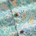 OROMEN Rococo Bloom Hawaiian shirt – engraved coconut buttons close-up with mint Baroque scroll and floral print background