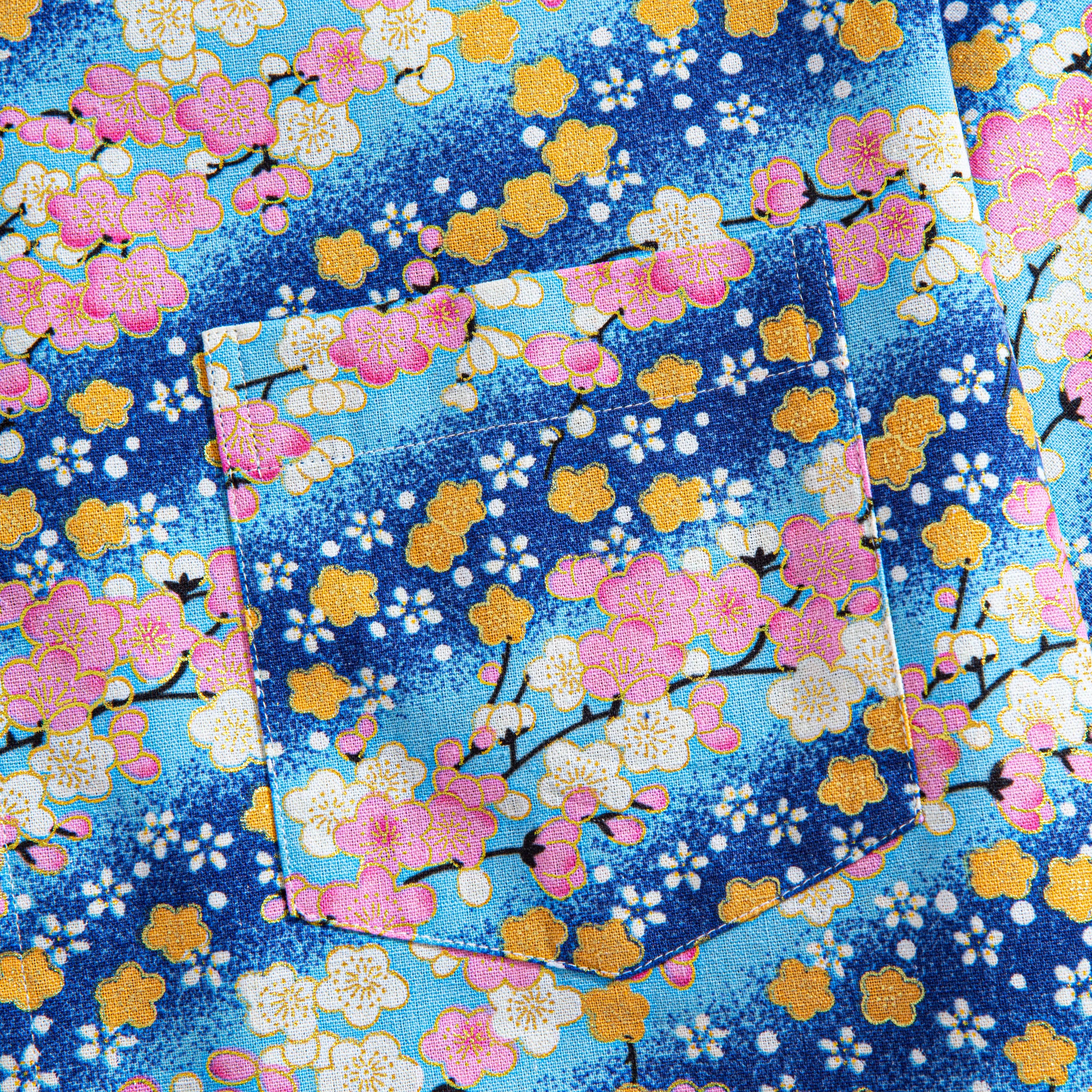 OROMEN Sakura Blooms Shirt – Chest Pocket Detail, Pink Sakura and Golden Plum Floral Print on Blue Cotton
