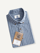 OROMEN Sashiko Chambray Cotton Shirt neatly folded flat lay displaying washed chambray texture