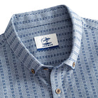 OROMEN Sashiko Chambray shirt button-down collar and branded label detail, navy Sashiko stitch on chambray blue