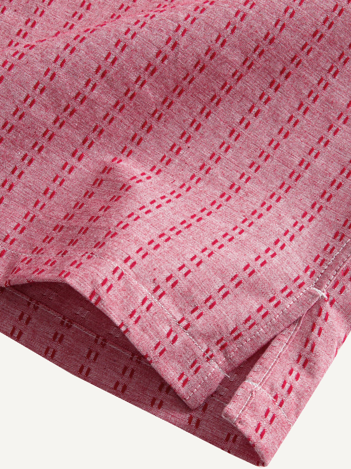 OROMEN Sashiko Cotton Shirt hem detail showing subtle side vent and clean tailored finish