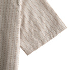 OROMEN Sashiko Natural shirt sleeve detail, tan running stitch stripe on natural oatmeal cotton