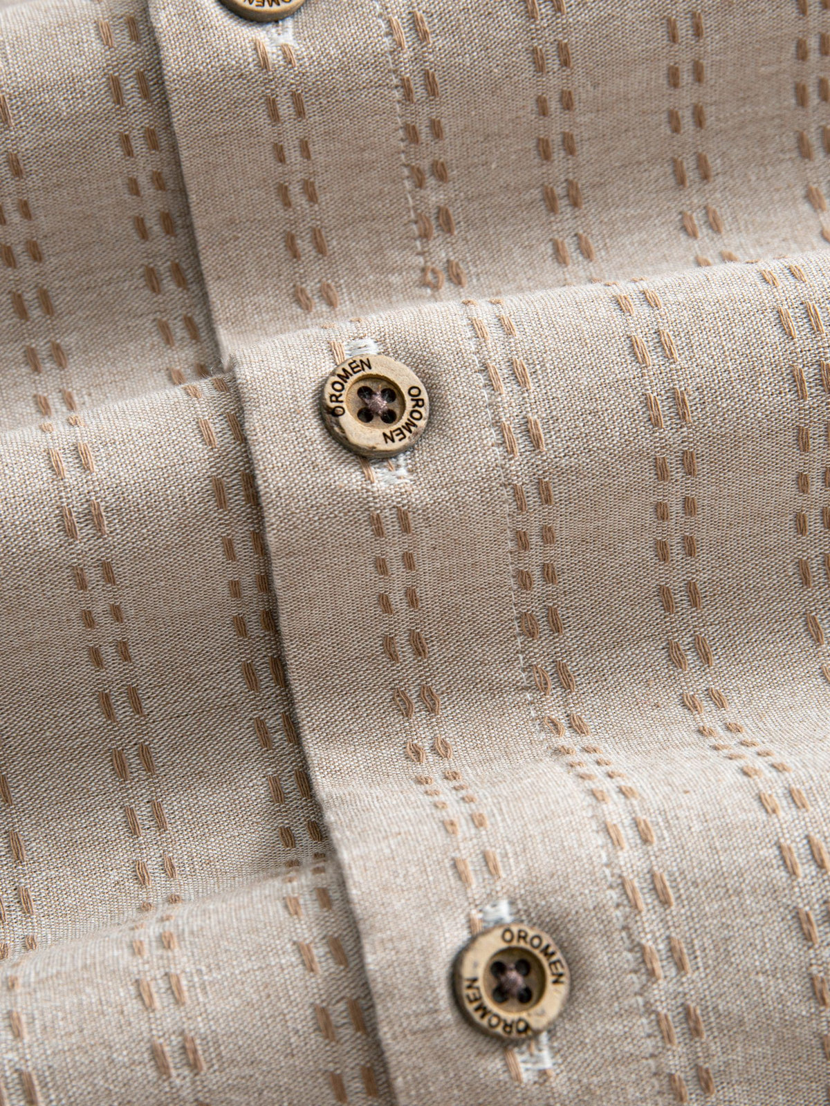 OROMEN Sashiko Stripe Cotton Shirt button placket detail featuring authentic natural coconut buttons