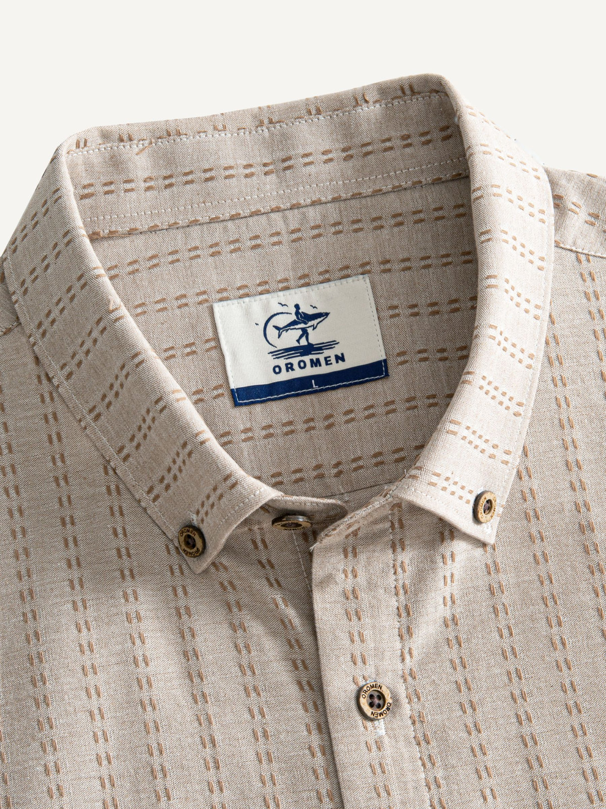 OROMEN Sashiko Stripe Cotton Shirt collar detail showing button-down collar and coconut buttons