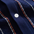 OROMEN Striped Jacquard Openwork Knit Polo navy blue white button placket close-up