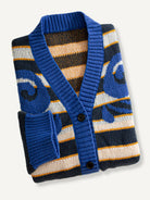 OROMEN Striped Swirl Jacquard Knit Cardigan neatly folded flat lay displaying swirl jacquard art