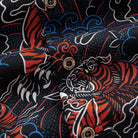 OROMEN Tiger Wave shirt – branded coconut button detail on black ground with red tiger and blue wave Japanese print