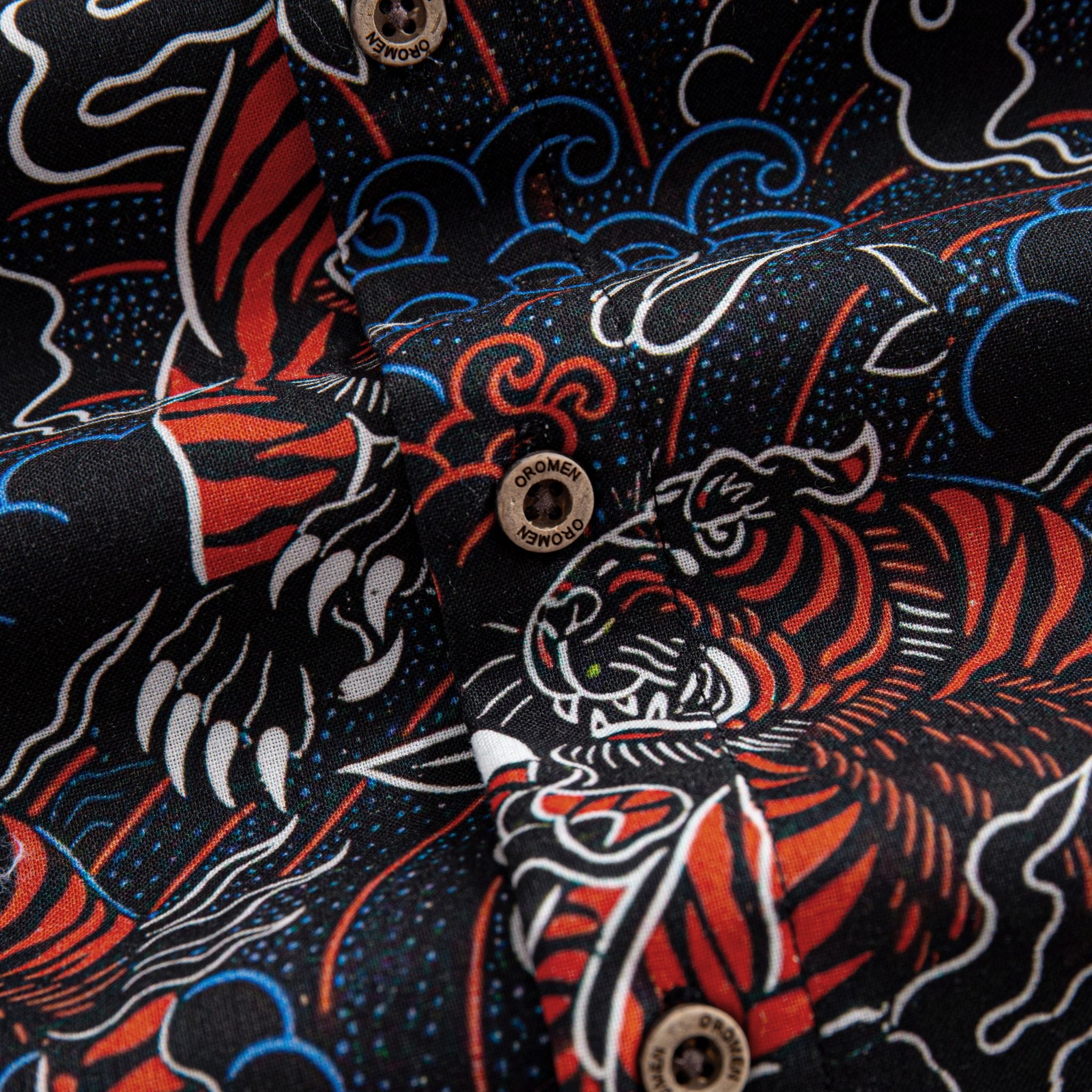 OROMEN Tiger Wave shirt – branded coconut button detail on black ground with red tiger and blue wave Japanese print