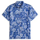 OROMEN Tropical Paradise Hawaiian Shirt – front full view on white background, navy blue with all-over white hand-painted hibiscus, pineapple and tropical leaf print, button-down collar, coconut buttons and chest pocket