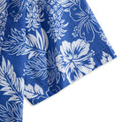OROMEN Tropical Paradise Hawaiian Shirt – sleeve cuff close-up with white hibiscus and tropical leaf print on navy blue Cotton-Tencel blend, short sleeve hem edge detail