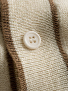 OROMEN Vertical Stripe Contrast Knit Polo button placket detail with tonal buttons and contrast trim