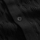 OROMEN Wave Jacquard Knit Polo black button placket close-up