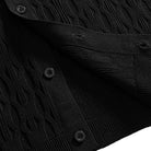 OROMEN Wave Jacquard Knit Polo black hem front center detail