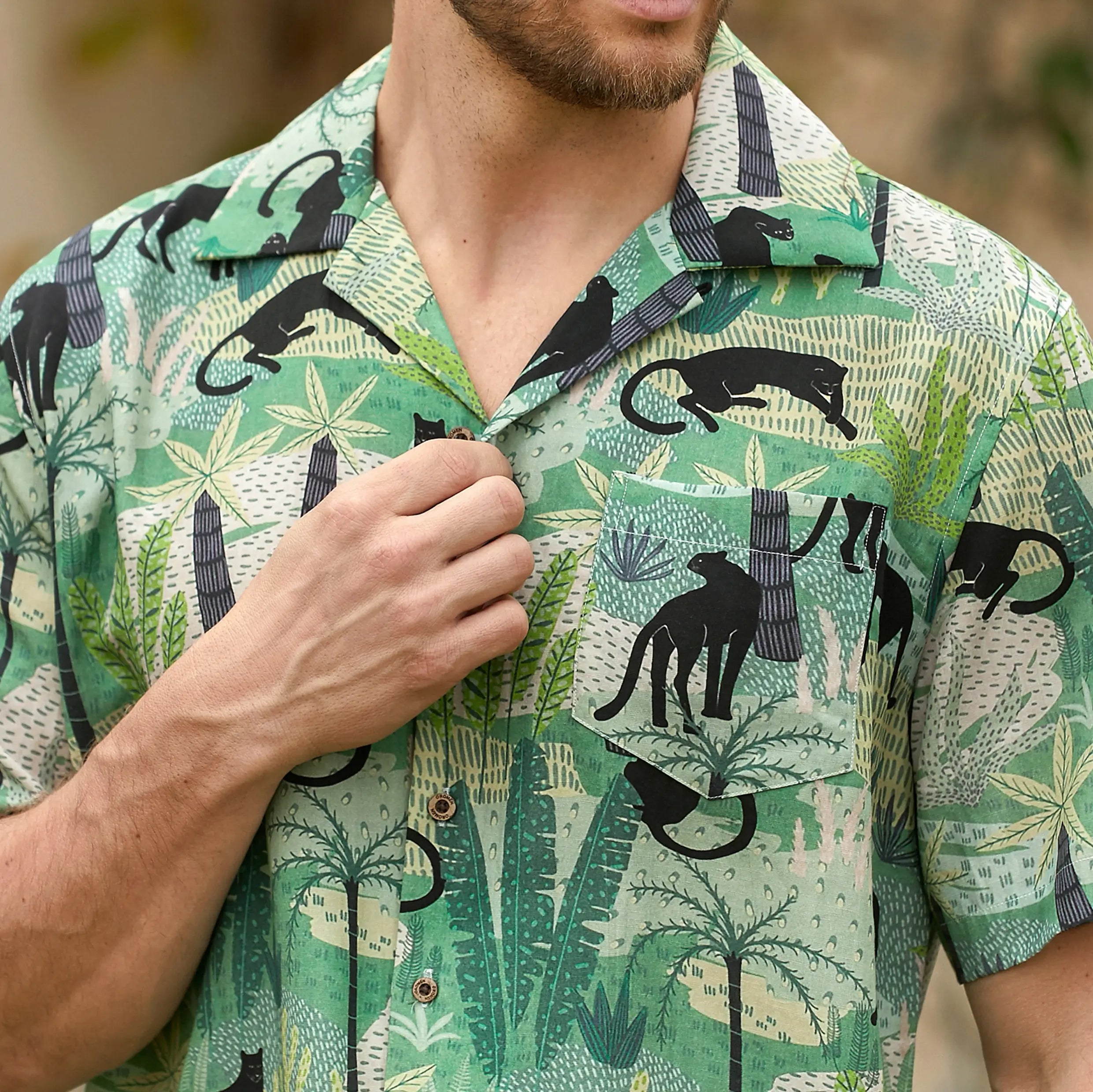 OROMEN  Wild Jungle Shirt Front Detail-Black Panther Print on Green Background
