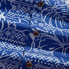 OROMEN branded coconut buttons and retro totem print detail on Plant Totem Hawaiian shirt