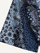 OROMEN indigo floral kimono cardigan sleeve cuff close-up