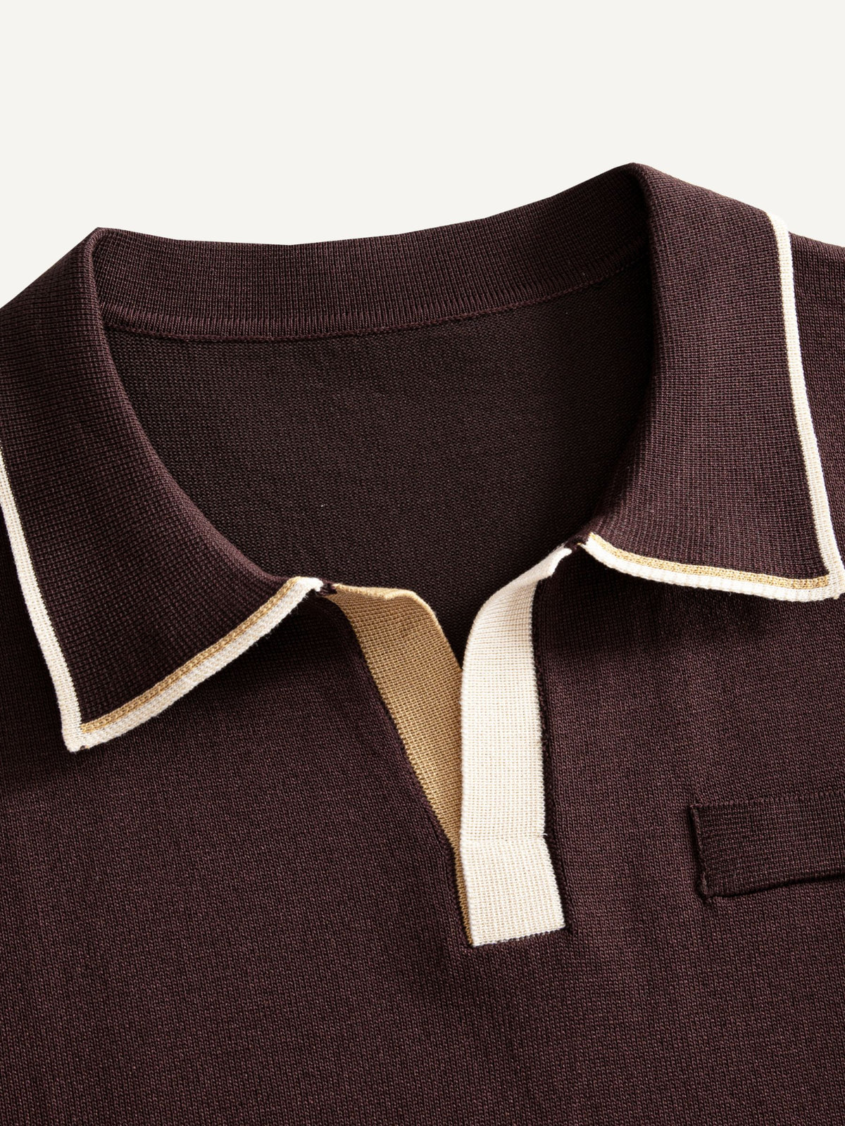 Open placket and contrast tipped polo collar detail on OROMEN Casa Mocha Knit Polo