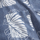 Premium linen fabric texture detail of Monstera Deliciosa shirt