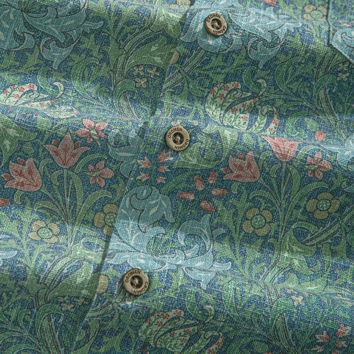 Premium linen fabric with intricate botanical floral print close-up