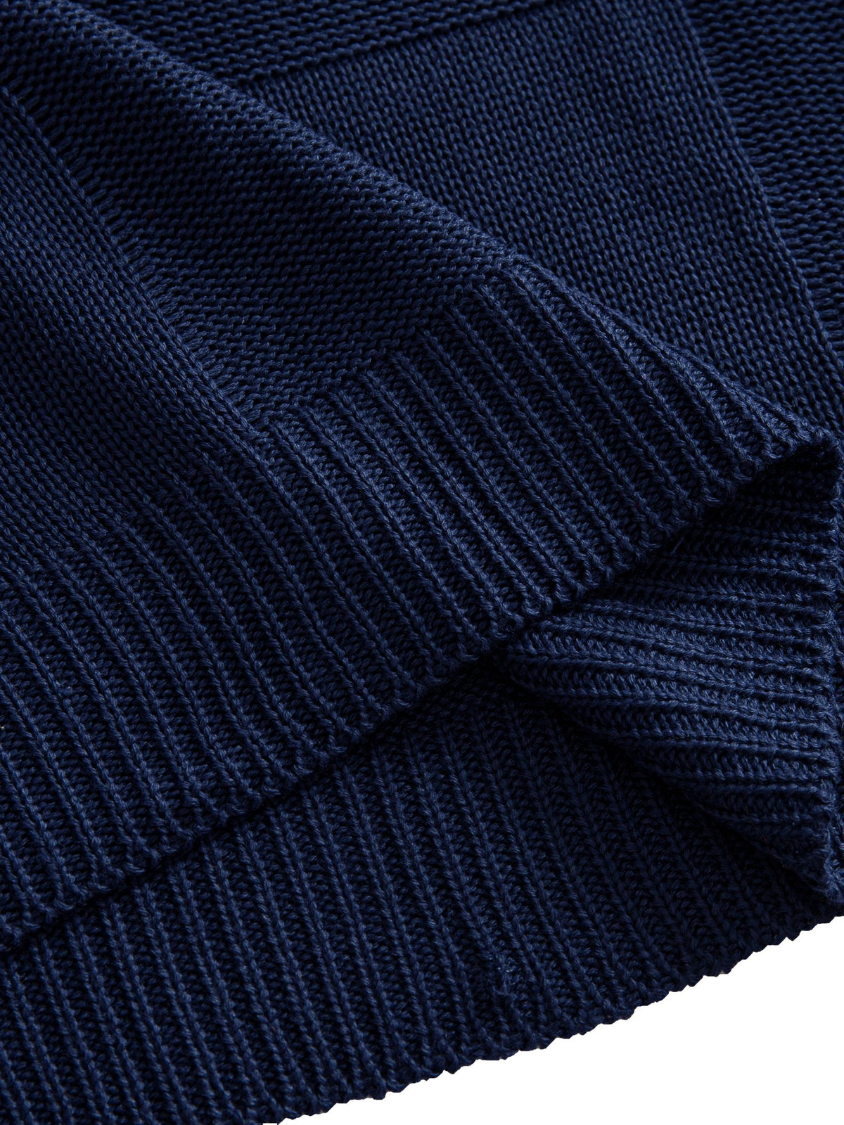 Ribbed bottom hem detail on OROMEN Grid Texture Knitted Sweater