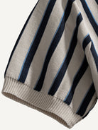 Ribbed sleeve cuff detail on OROMEN Stripe Knit Open-Collar Polo