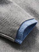 Ribbed sleeve cuff with contrast tipping detail of OROMEN Two-Tone Collar Knit Sweater