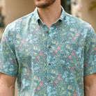 Secret Garden aloha shirt front view on model - garden courtyard inspired design