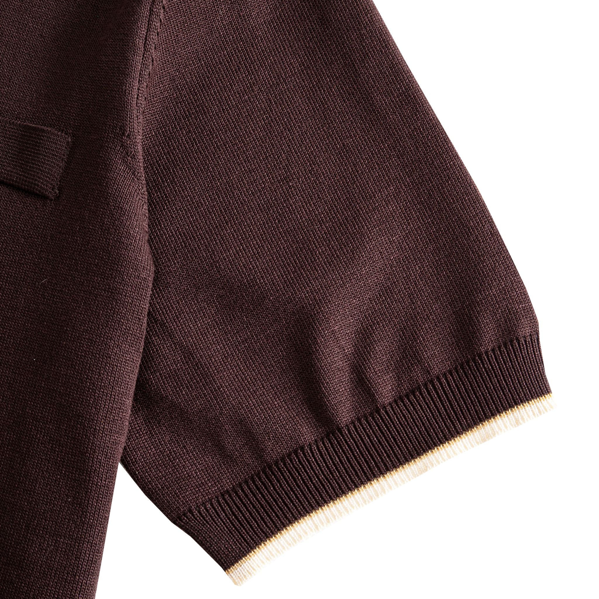 Short sleeve cuff close-up with off-white contrast ribbed tipping,
chocolate brown viscose knit polo shirt – OROMEN