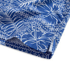 Side vent detail of OROMEN Plant Totem Hawaiian shirt – relaxed fit hem with retro totem print