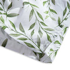 Side vent detail of OROMEN Willow Bough Hawaiian shirt – relaxed fit hem with green willow branch print