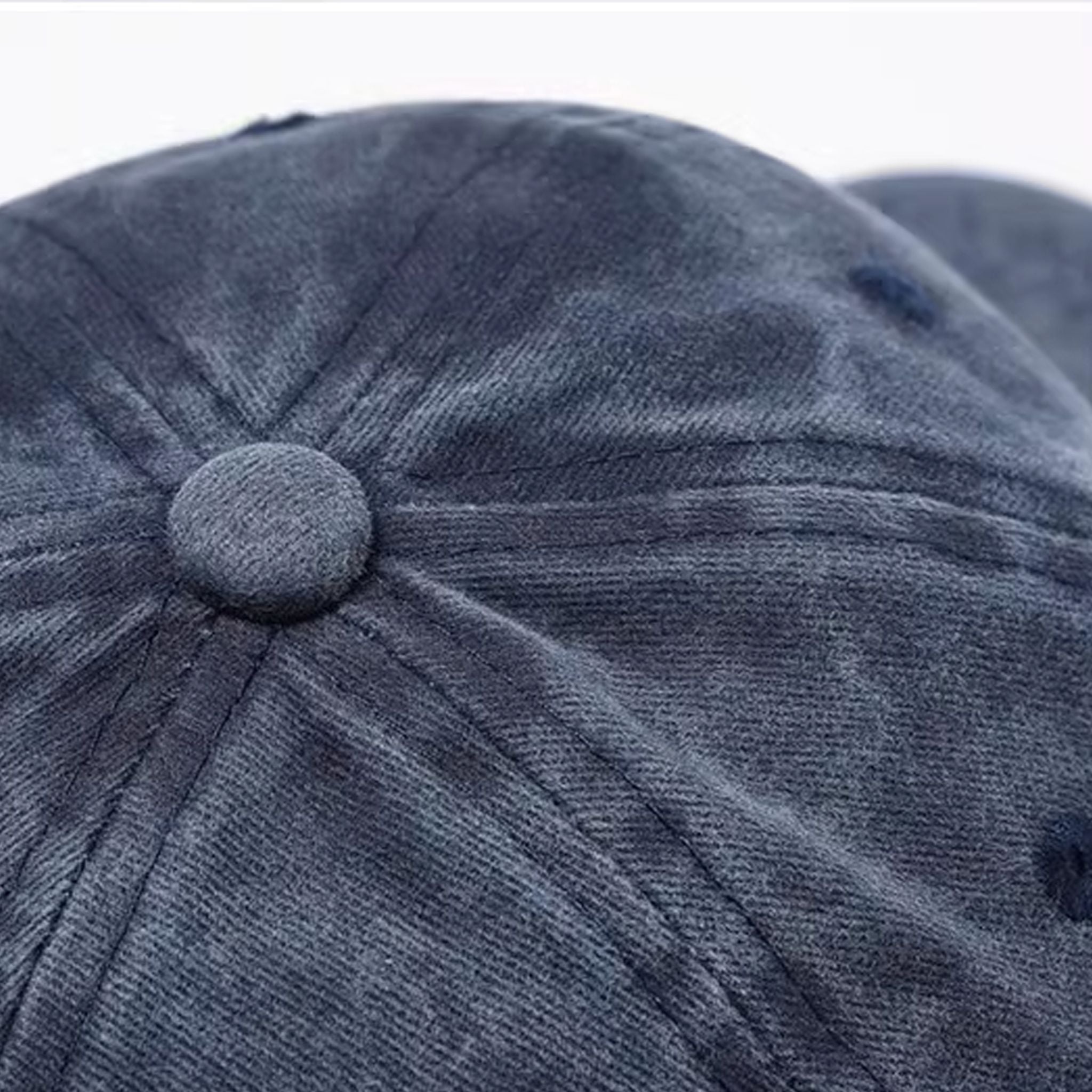 Side view of Japanese embroidered baseball cap with curved brim and breathable eyelets